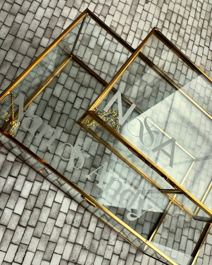 Custom engraved glass keepsake boxes — in-shop production