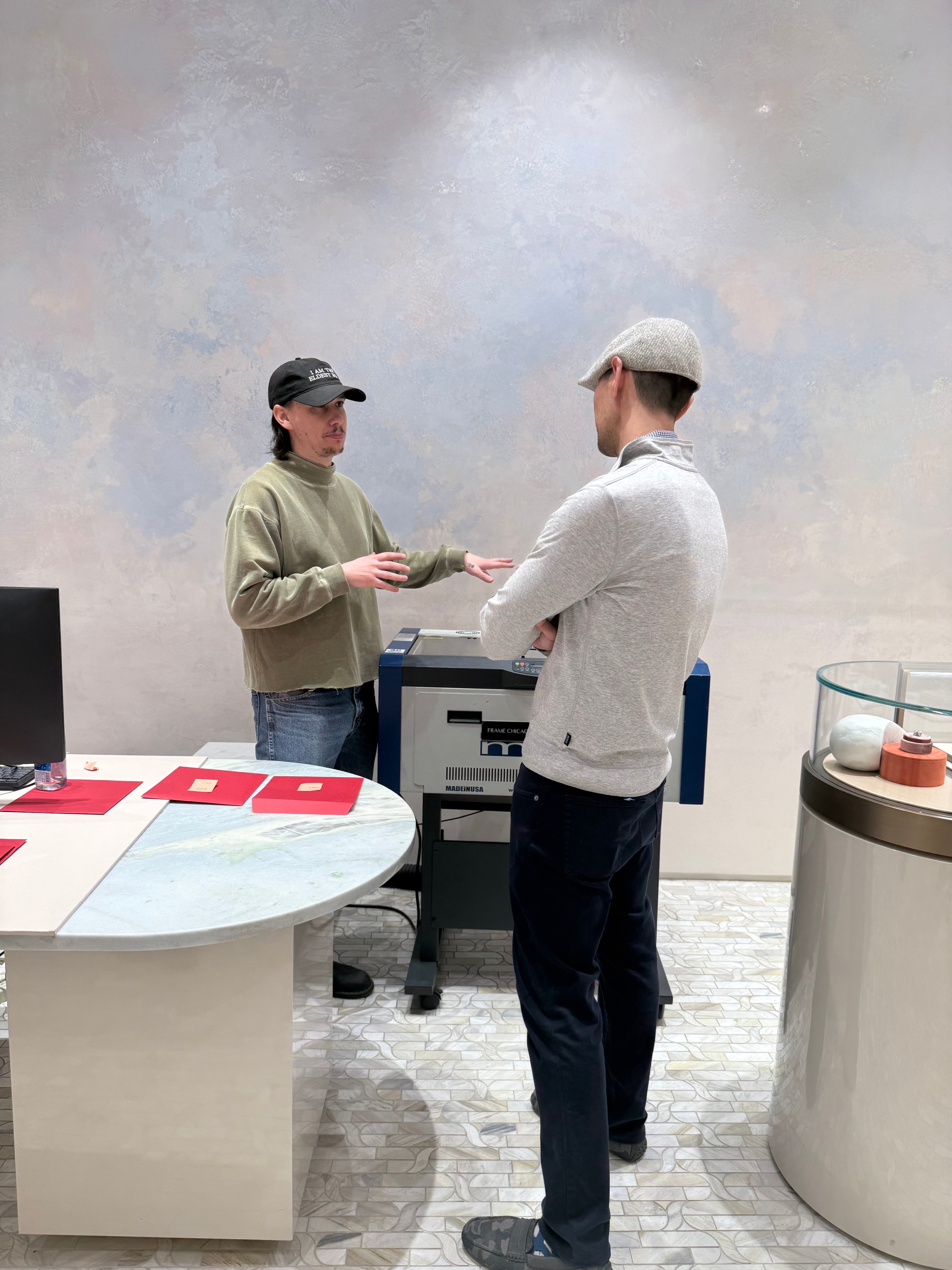 The laser engraving machine set up on-site at a retail activation
